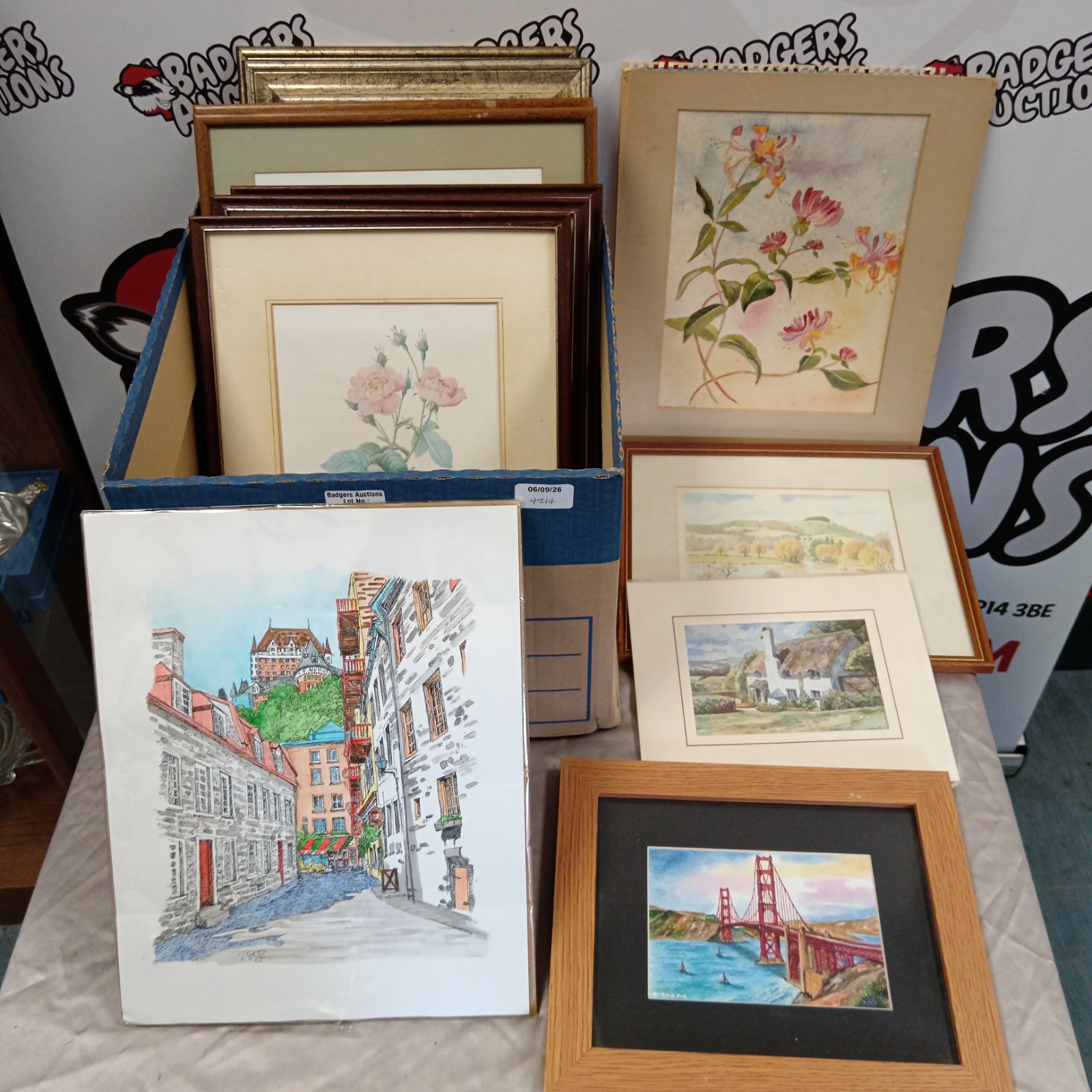Mixed lot of framed prints and artworks including a suspension bridge print.