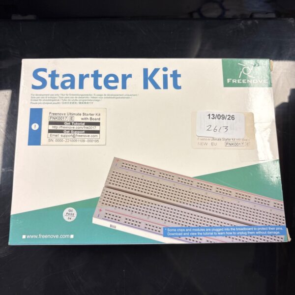 Freenove Ultimate Starter Kit with components and baseboard.