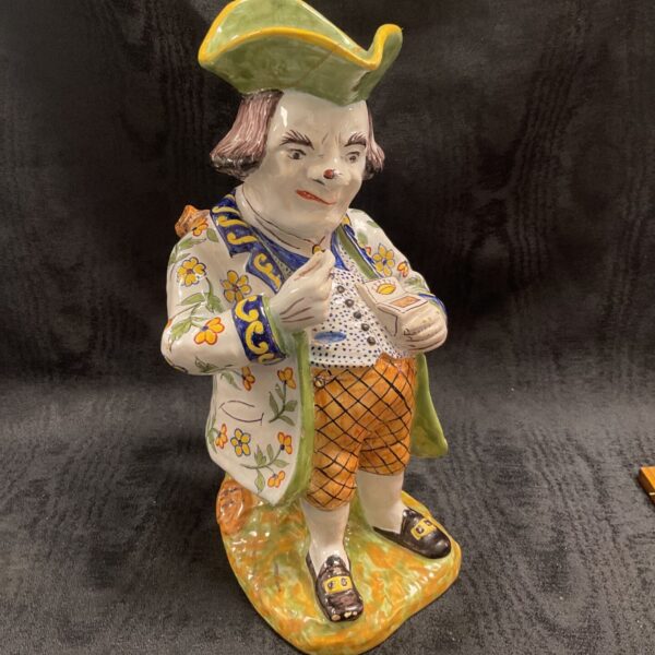Antique 19th century French porcelain snuff taker figurine.