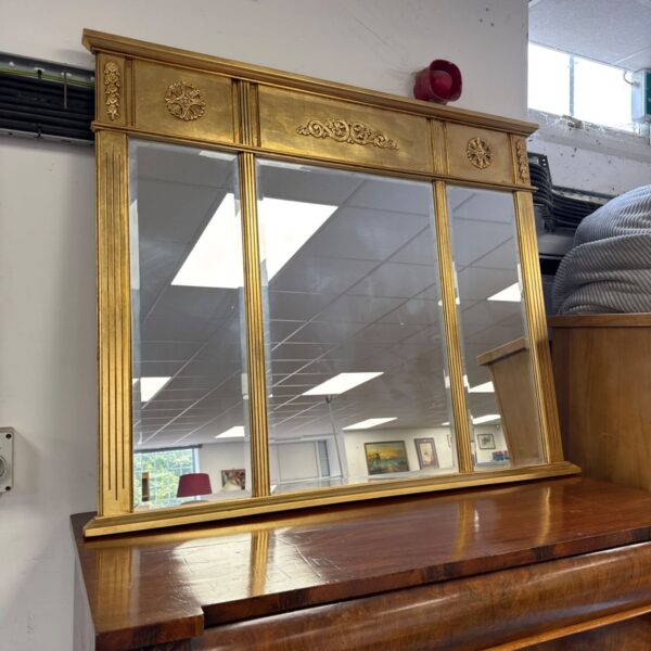 Large French style triple mirror with gold frame.