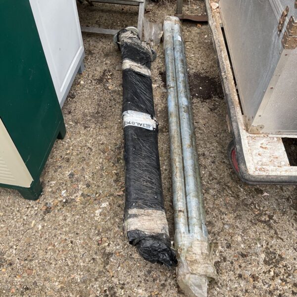 Set of galvanised fence posts for garden fencing.