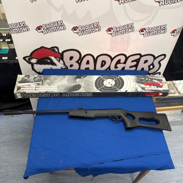 Gamo Delta Fox Whisper air rifle with box in auction setting.