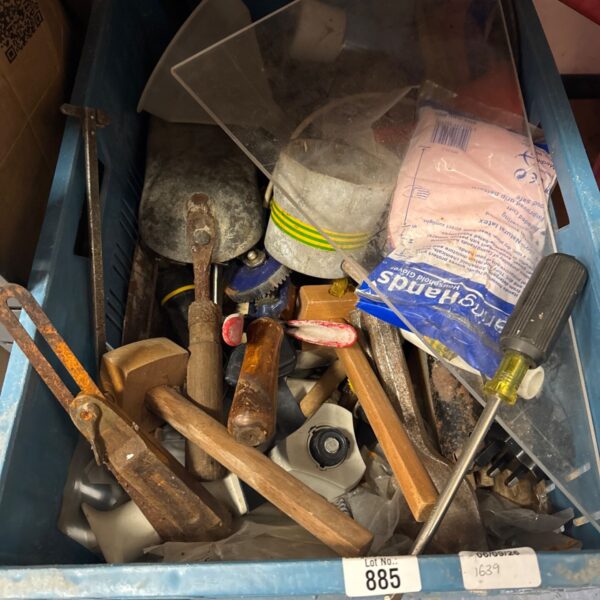 Assorted garage clearance tools including wrenches and screwdrivers.
