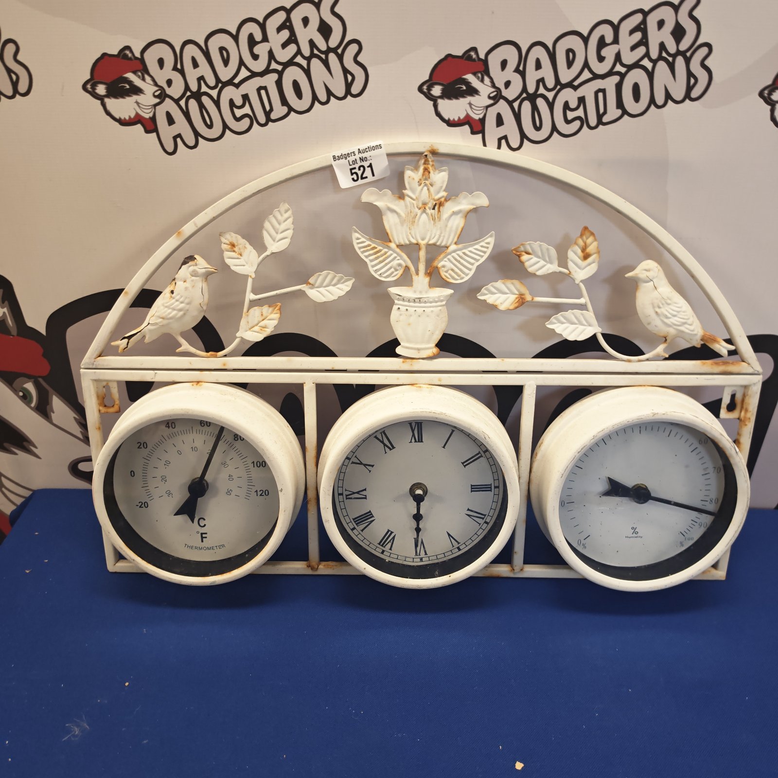 Vintage garden clock barometer for outdoor wall mounting.