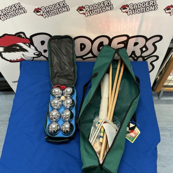 Vintage garden games set featuring boules and croquet in a bag.