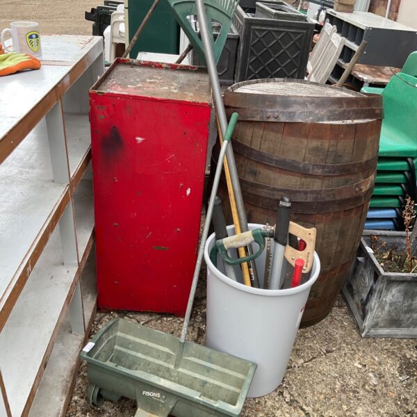 Vintage garden tool lot with red tub and seed spreader.