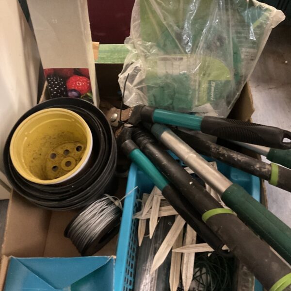 Mixed lot of garden tools and accessories including shears and twine.