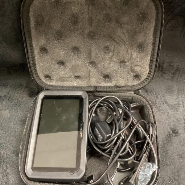 Garmin sat nav unit inside protective case, GPS device for car navigation.