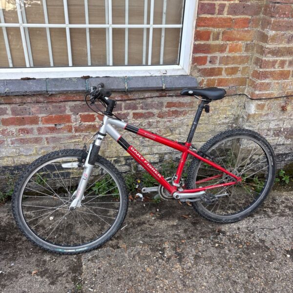 Vintage Gary Fisher Wahoo mountain bike in red and silver.