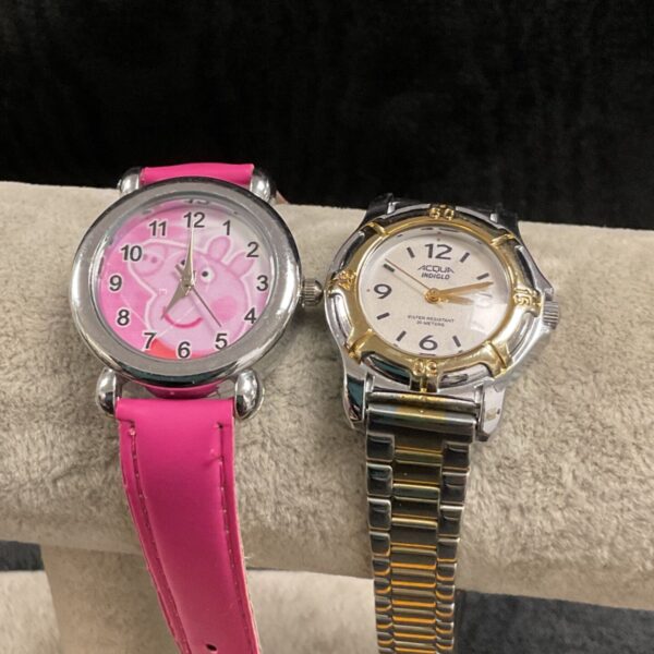 Pink Peppa Pig girls quartz wristwatch, colourful and playful.