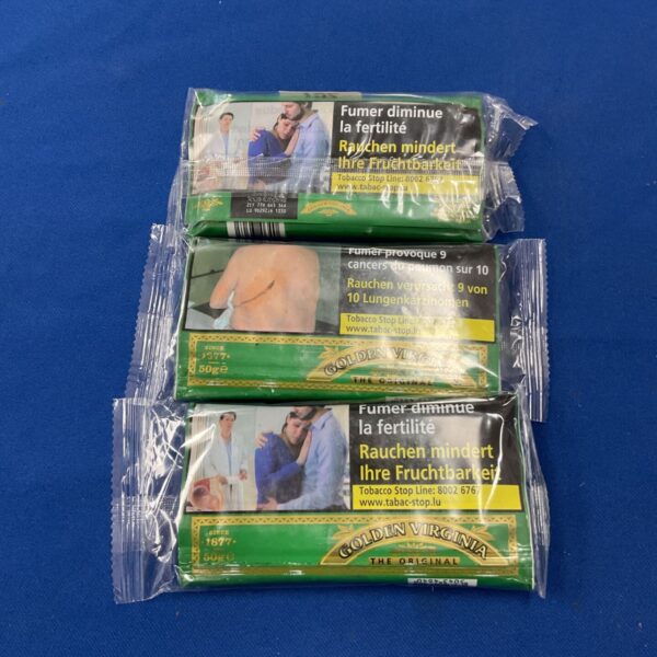 Sealed packs of Golden Virginia rolling tobacco for collectors.