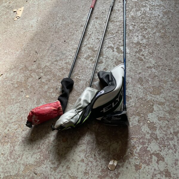 Vintage golf clubs lot featuring a Titleist 9D3 driver.