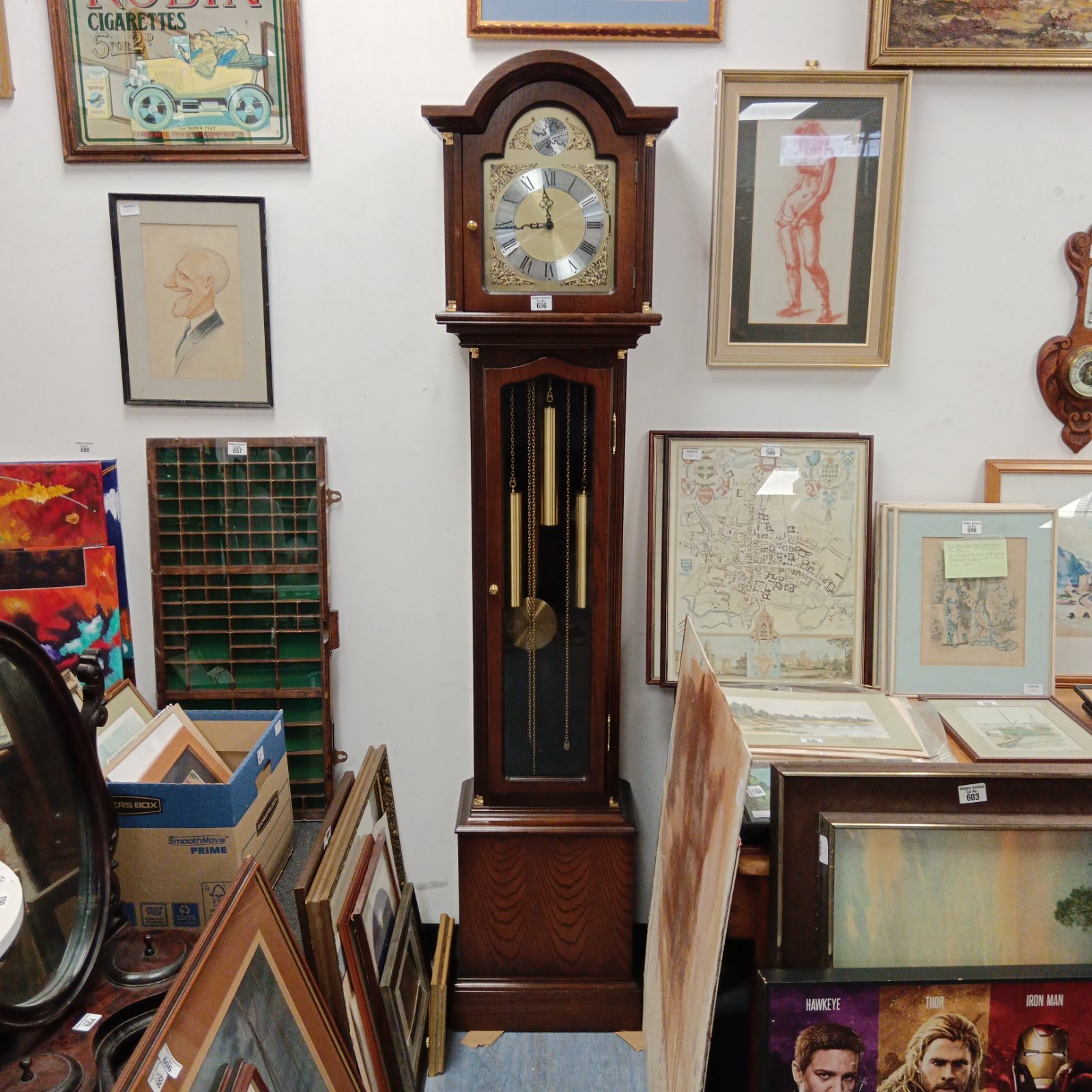 Antique grandfather clock with Tempus Fugit painted on the arch.