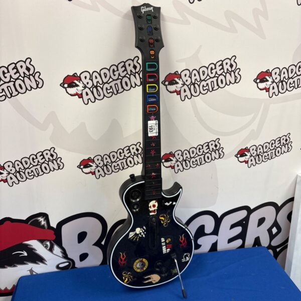 Black and red Guitar Hero Gibson Les Paul guitar accessory.