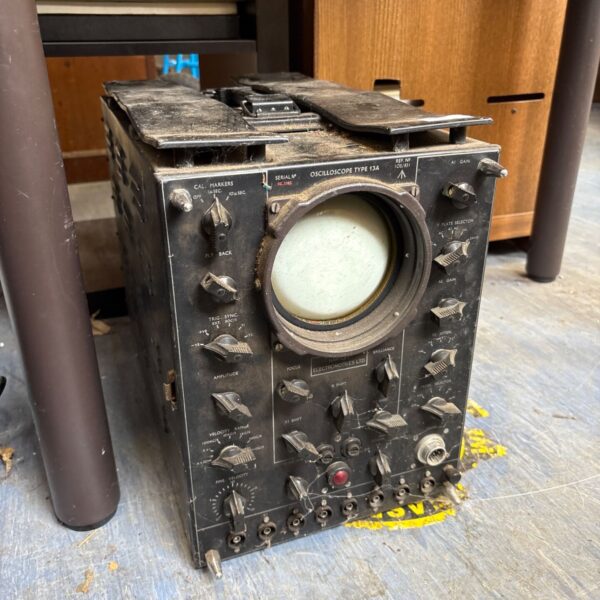 Vintage Hartley Electromotives oscilloscope Type 13A with circular screen.