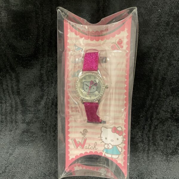 Pink Hello Kitty wristwatch in original packaging, collectible character watch.