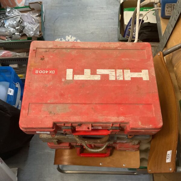 Hilti DX 400B powder actuated tool in its original case.
