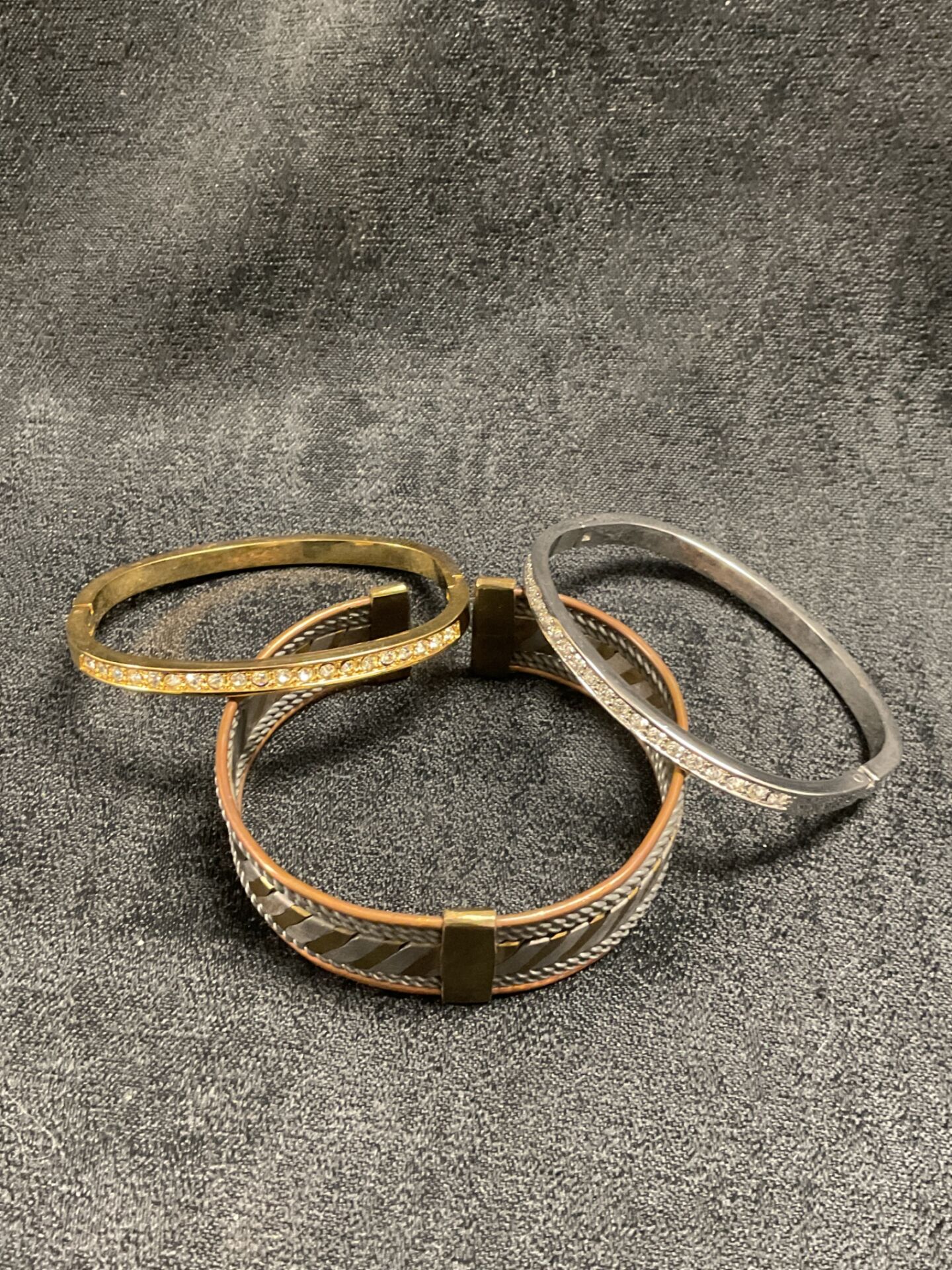 890 Two Hinged Bracelets set with white stones and Copper cuff bracelet