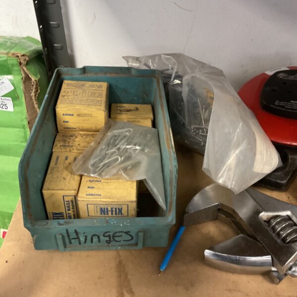 Hinges and nails lot for DIY projects and repairs.