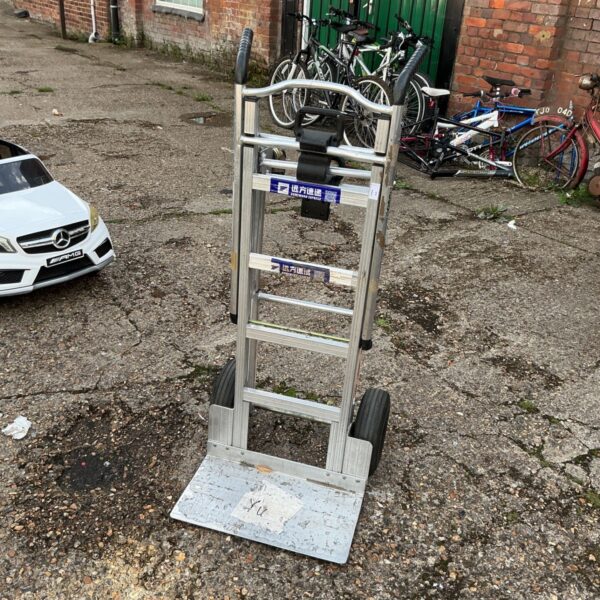 Vintage Homeward Express sack barrow for industrial use.