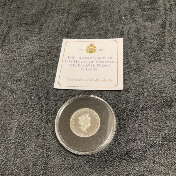 House of Windsor silver proof coin with certificate of authenticity.