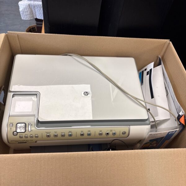 HP Photosmart C5180 all-in-one printer with accessories.