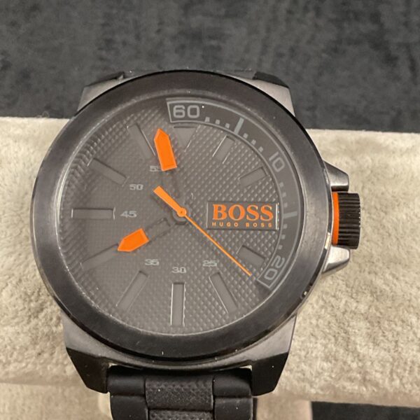Close-up of a Hugo Boss quartz wristwatch with a grey dial.
