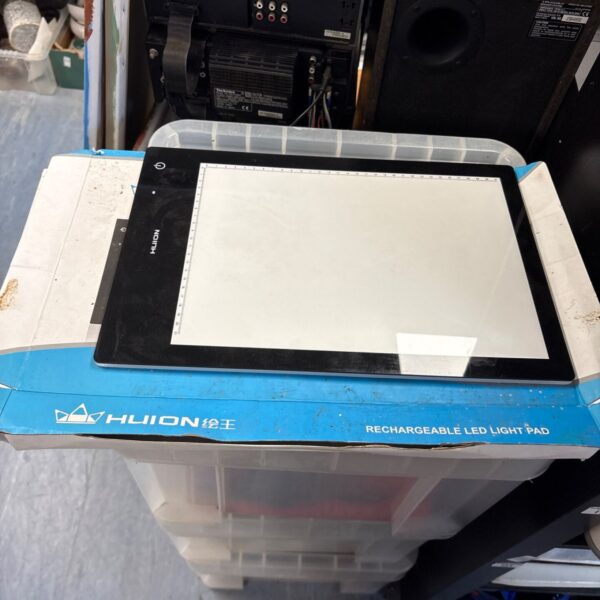 Huion rechargeable LED light pad for tracing and art projects.