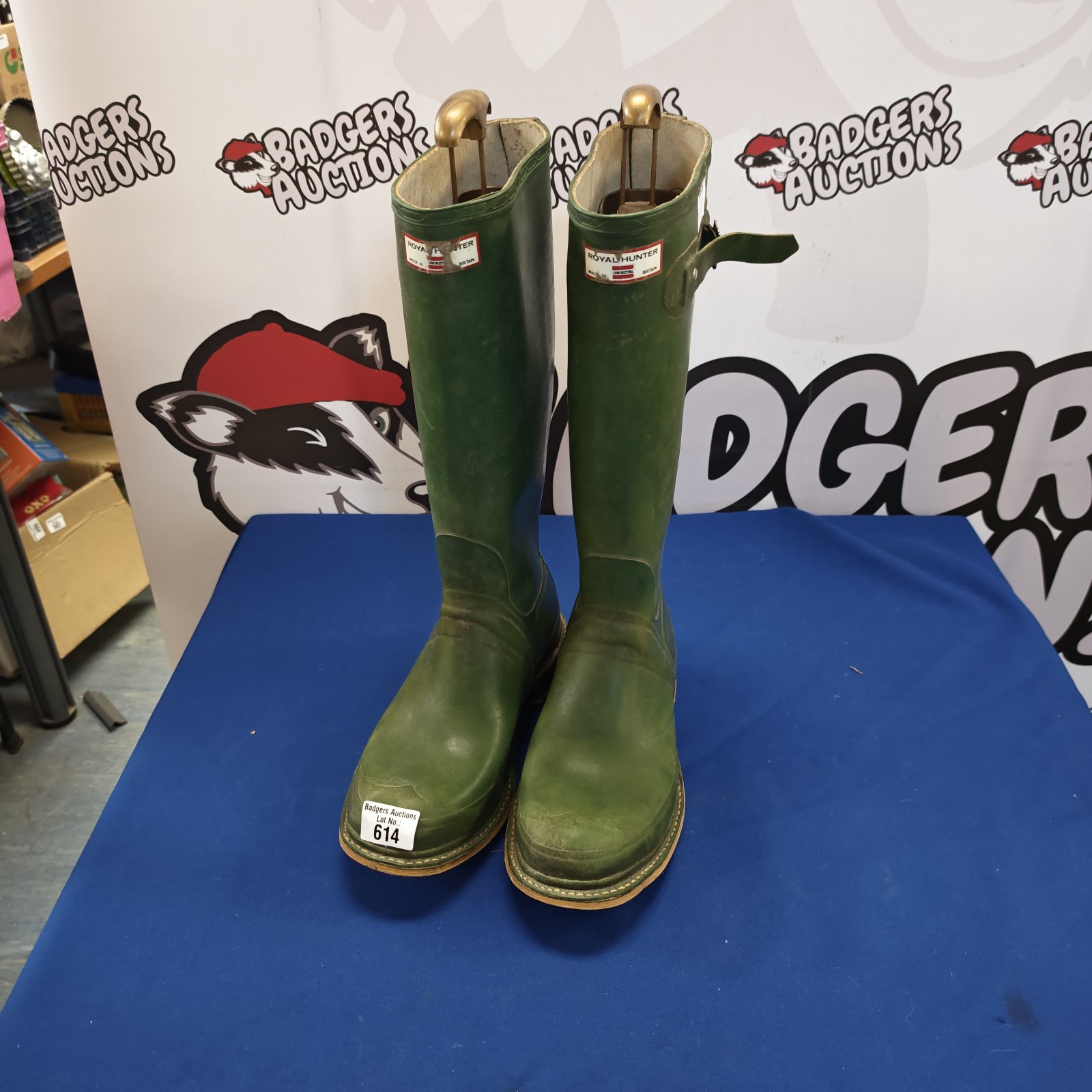 Green Hunter Wellington boots size 11, ideal for outdoor use.