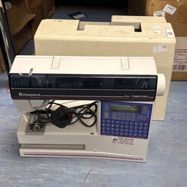 Vintage Husqvarna Viking 500 computer sewing machine in used condition.