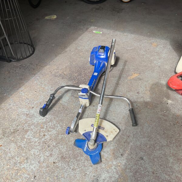 Used Hyundai petrol strimmer for garden maintenance.
