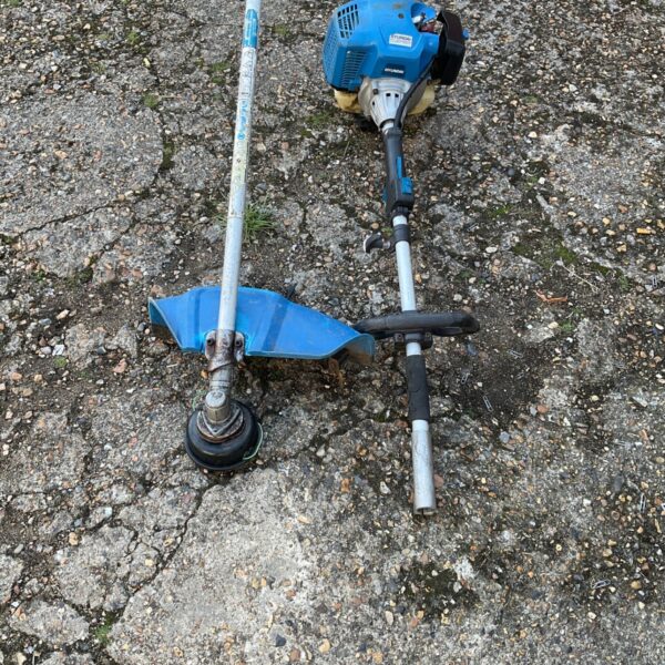 Hyundai petrol strimmer for garden maintenance and repair.