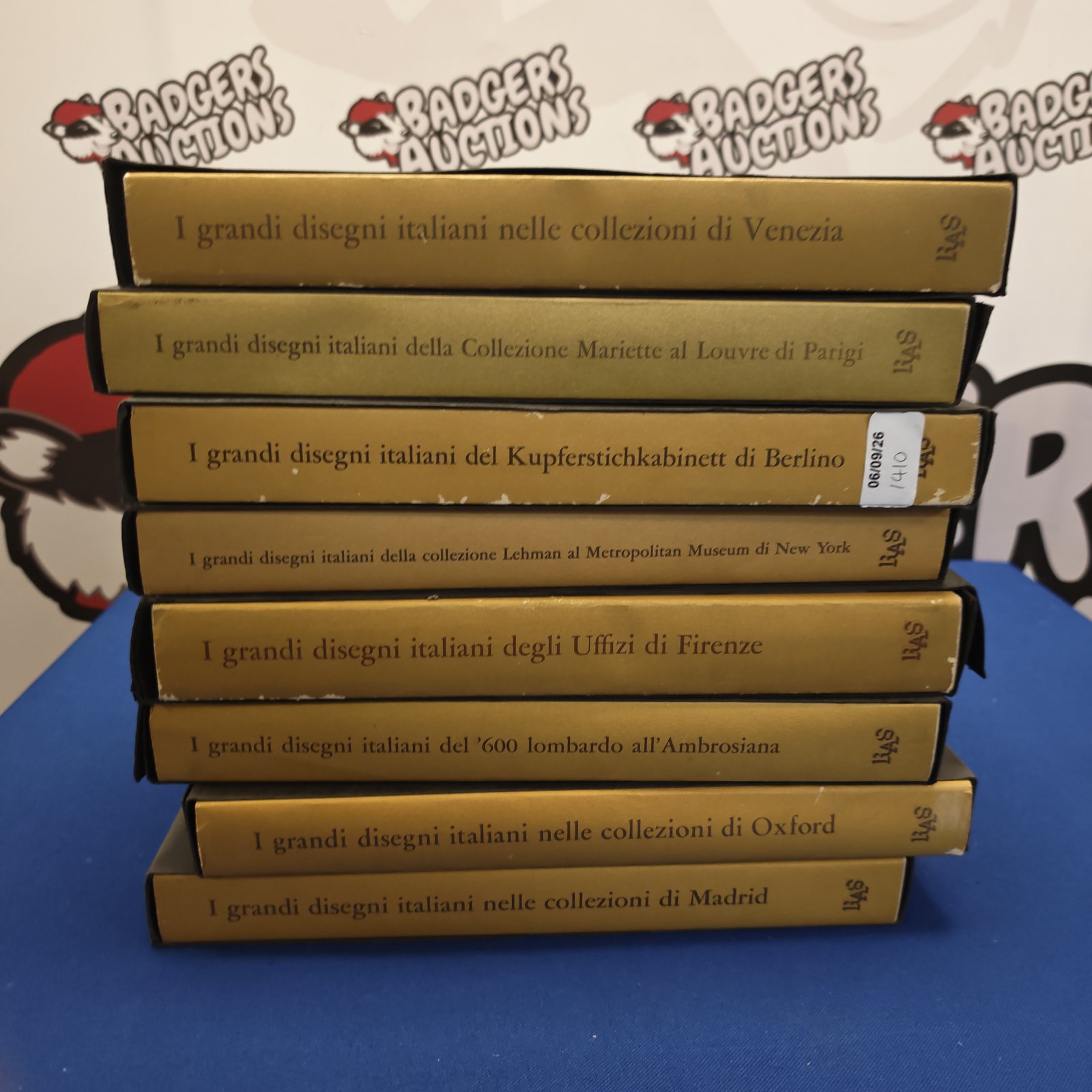 Stack of "I grandi disegni italiani" art books.