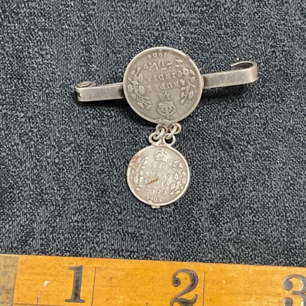 Vintage Indian coin brooch featuring a 1904 rupee coin.