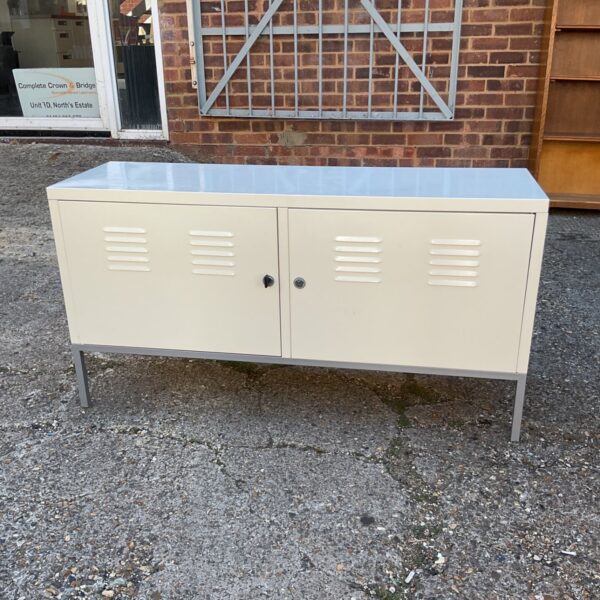 Vintage industrial metal cabinet with locking door.