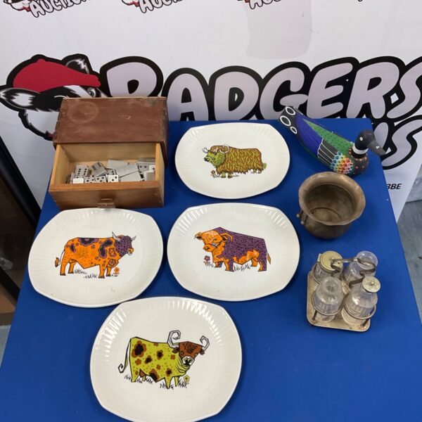 Vintage Ironstone Beefeater plates with dominoes and duck ornament.