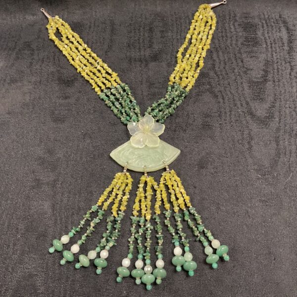 Vintage jadeite multi-strand necklace with graduating green beads.