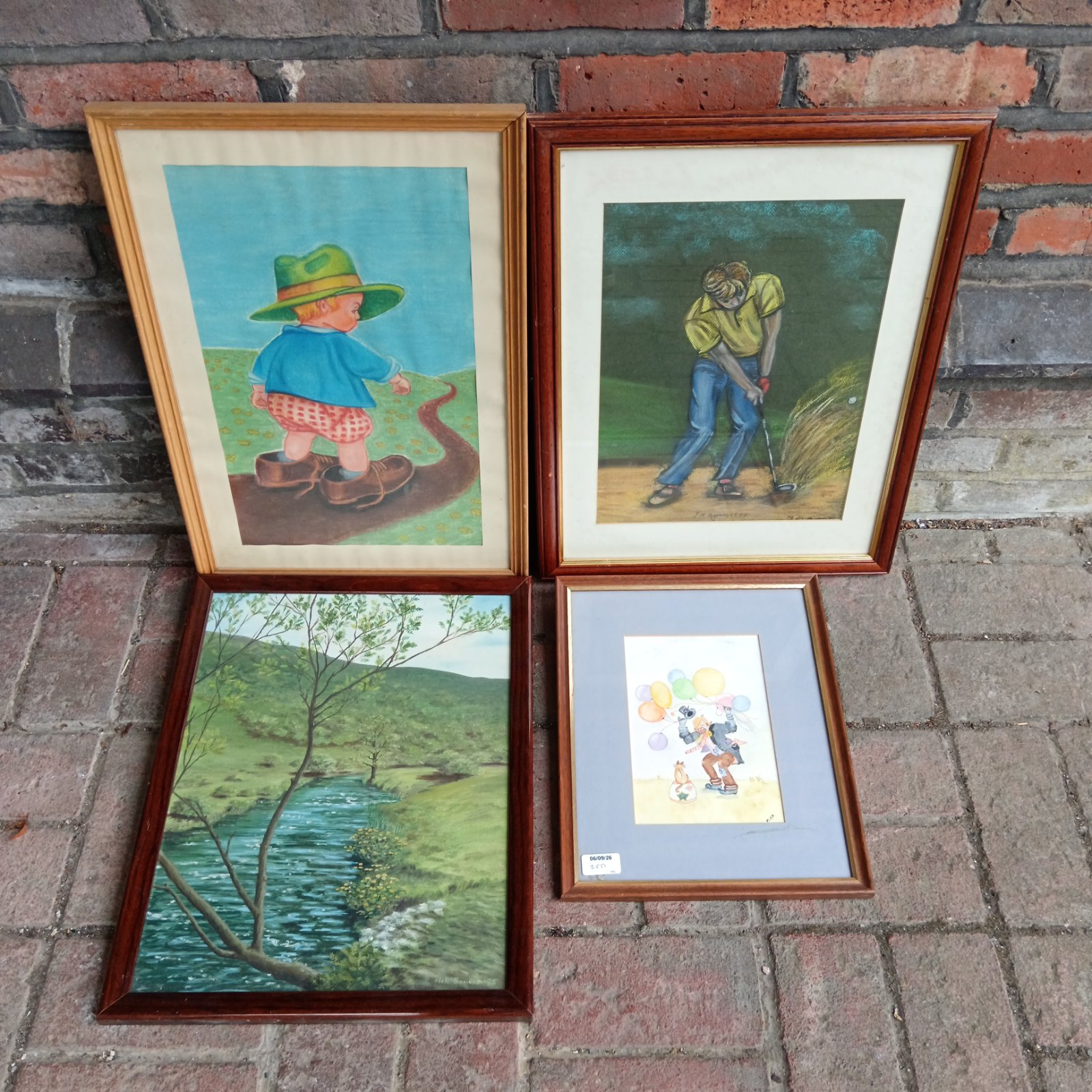 Vintage watercolour painting of a boy fishing by a river.