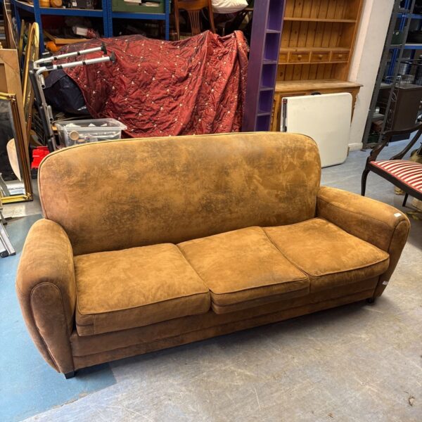 Brown John Lewis suede couch, a comfortable three-seater sofa.
