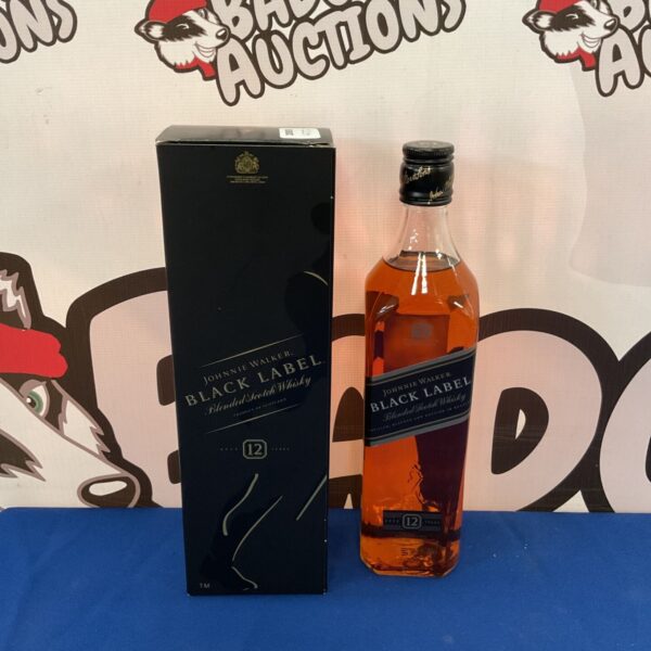 Sealed bottle of Johnnie Walker Black Label Scotch whisky.