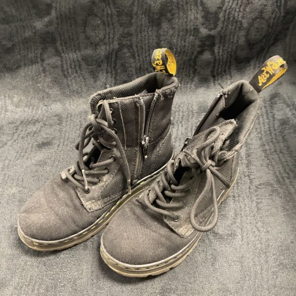 Pair of worn kids Dr Martens boots, size UK12.