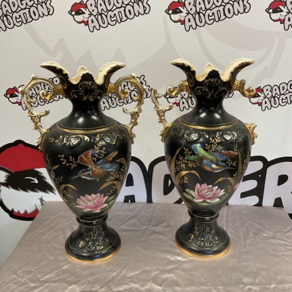 Antique porcelain vases with hand-painted kingfisher design, one damaged.