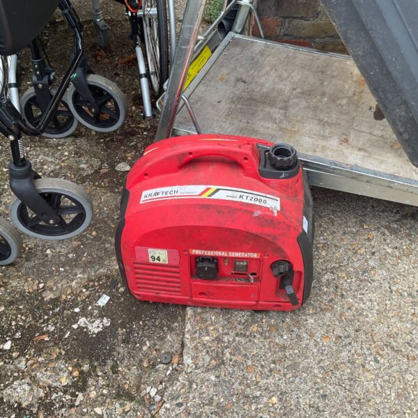 Red Kraftech KT2000 petrol generator for outdoor power.