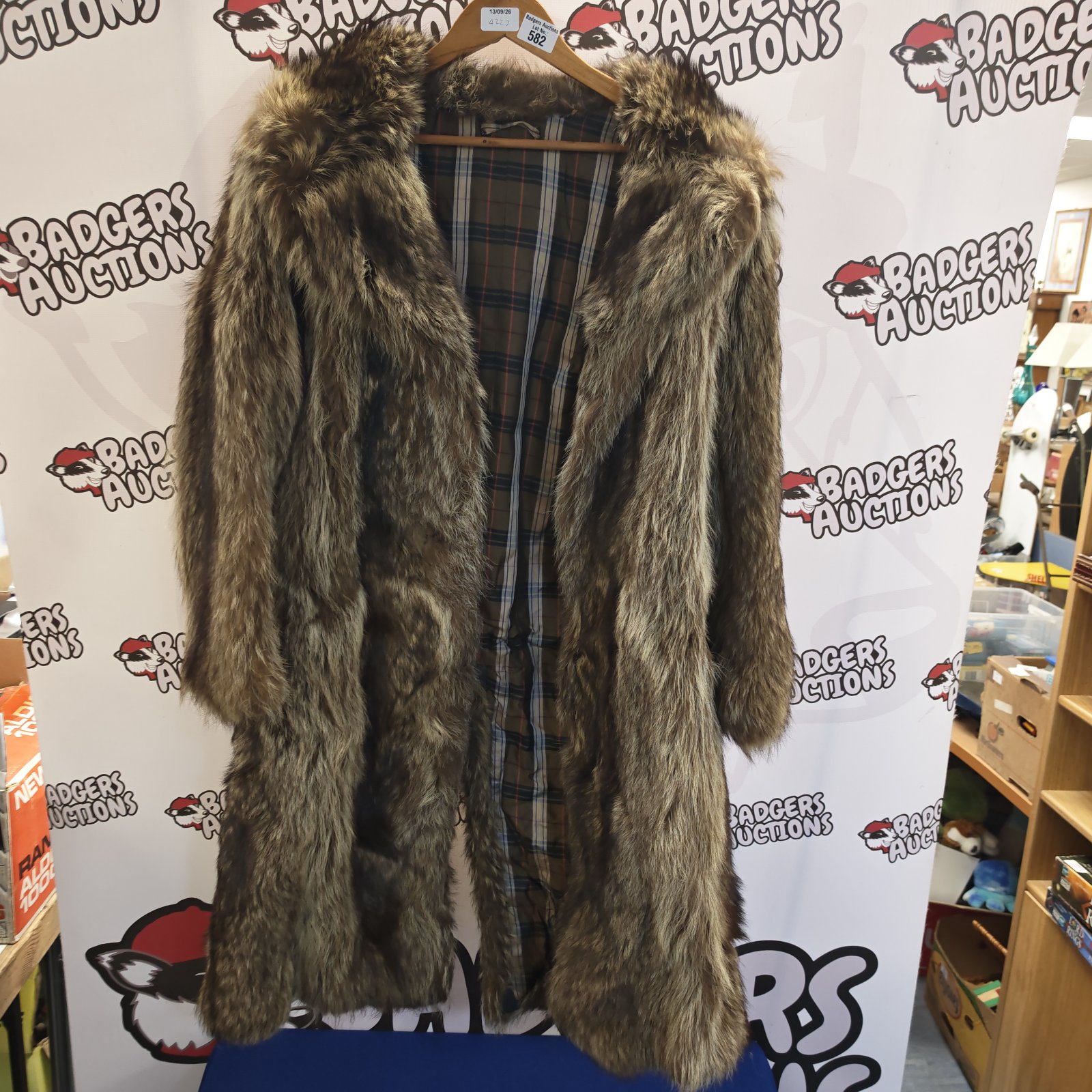 Ladies faux fur coat with tartan lining, vintage style.