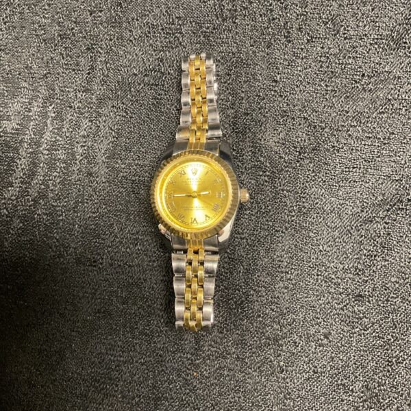 Gold tone ladies Rolex quartz watch, vintage style.