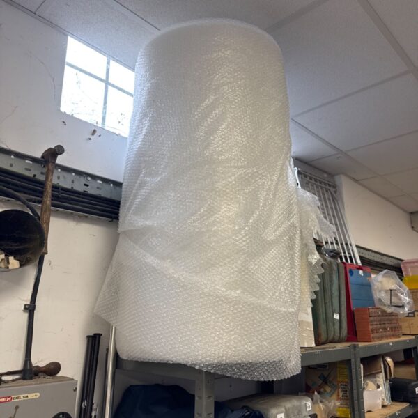 Large roll of bubble wrap for shipping and protective packaging.