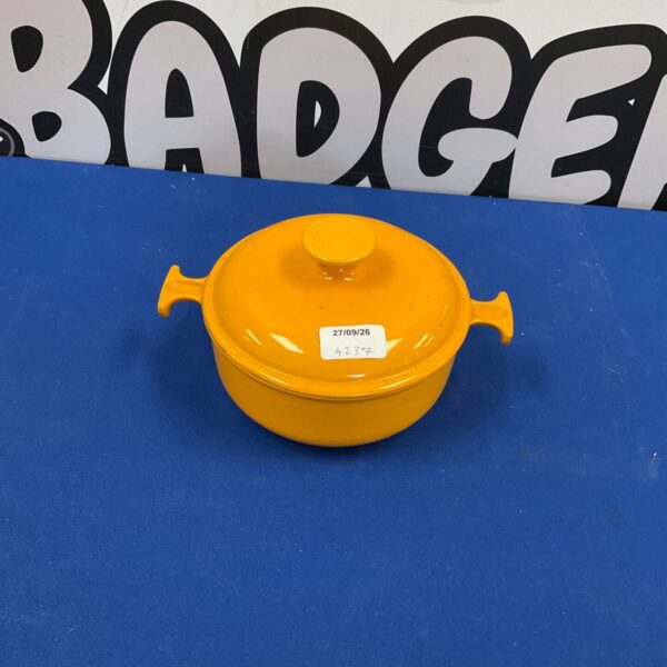 Vintage orange Le Creuset No 17 casserole dish with lid.