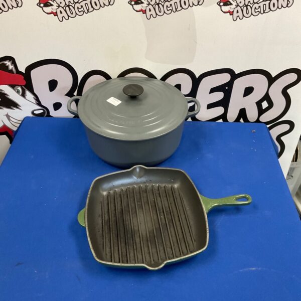 Vibrant Le Creuset skillet with enamel coating, ideal for cooking.