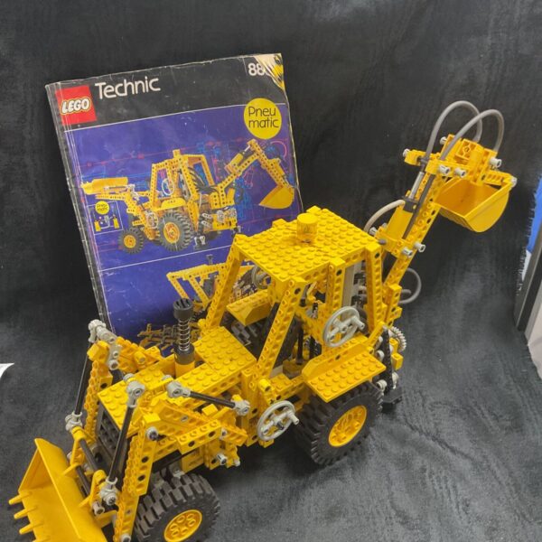 Lego Technic 8862 JCB excavator with instructions, a vintage construction toy.
