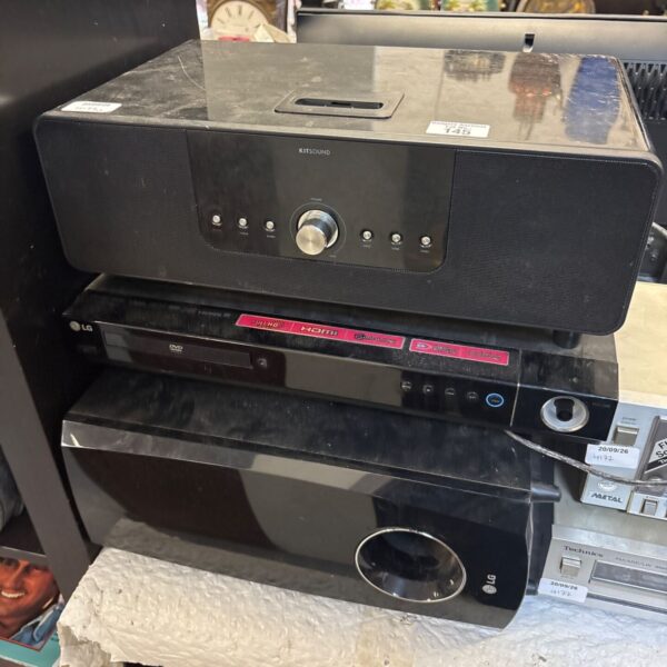 LG subwoofer system with DVD player and iPod dock.